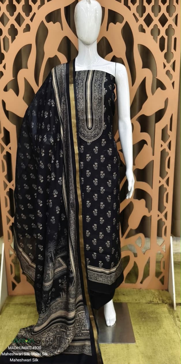Black Maheshwari silk suit on mannequin